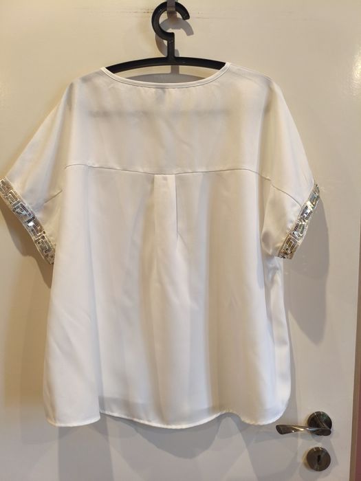 Elegancja biała bluzka dekolt w serek roz. 42-44