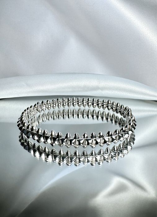 Золотий браслет у стилі Cartier