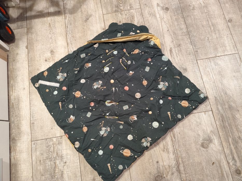 Dwustronny otulacz do fotelika