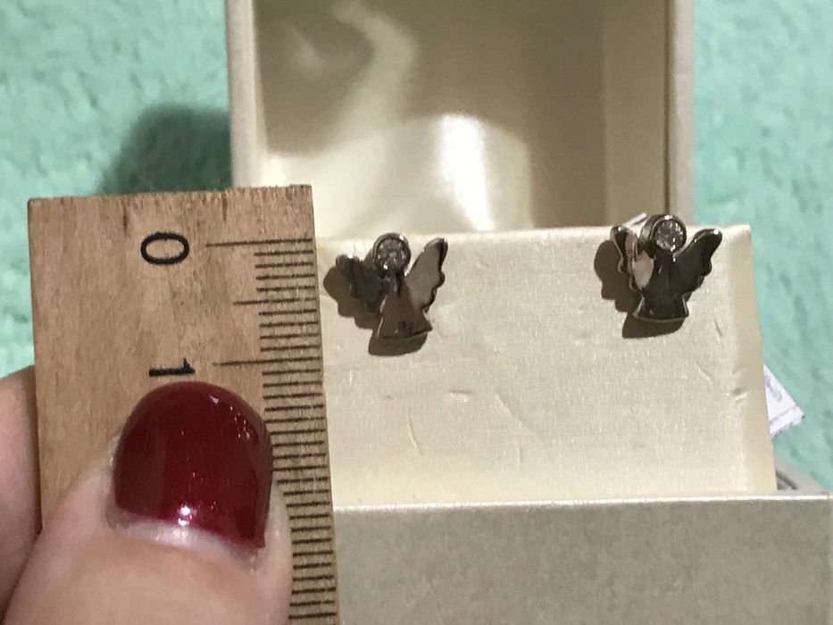 Очень оригинальные золотые серьги в белом золоте на закрутках!