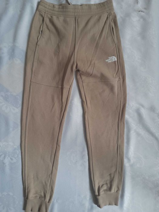 spodnie dresowe damskie the north face super stan