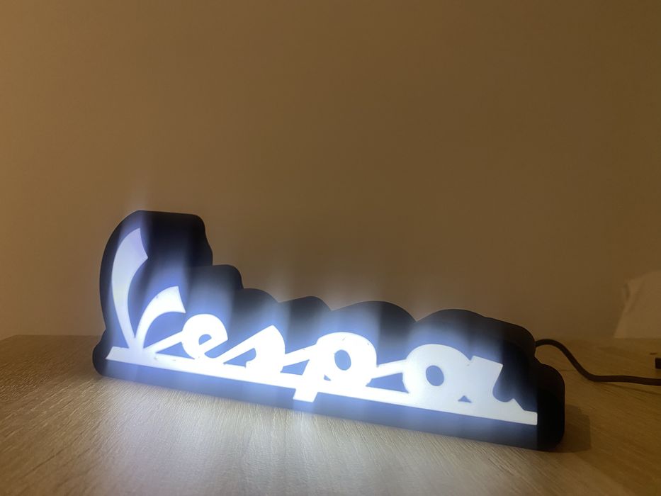 Logotipo luminoso Vespa