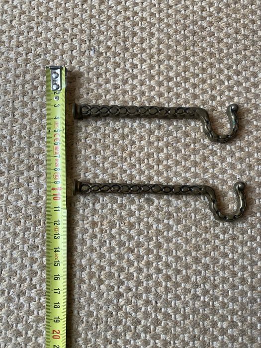 Par de peças em bronze para pendurar varão de cortinas