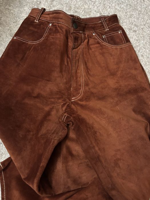 Calças em pele genuina