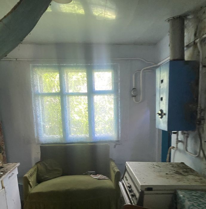 Будинок земельною ділянкою 50 сотих