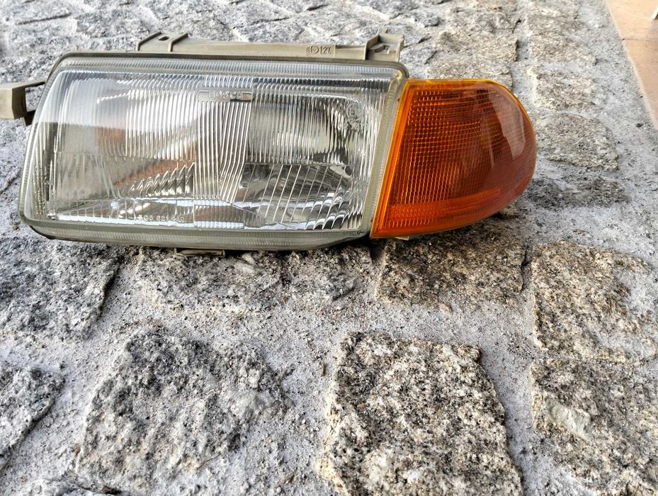 Farol / Ótica dianteiro + pisca + farolim + jante/pneu + grelha dianteira + tampões Opel Astra F