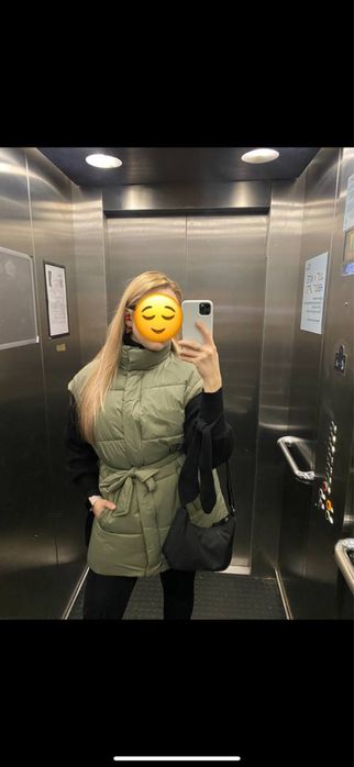 Жилетка кольору хакі 42 розмір