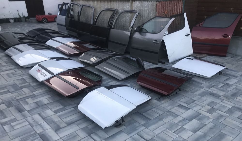 Двері ліві перед , дверь ліва задня skoda roomster 9102 срібло, замок