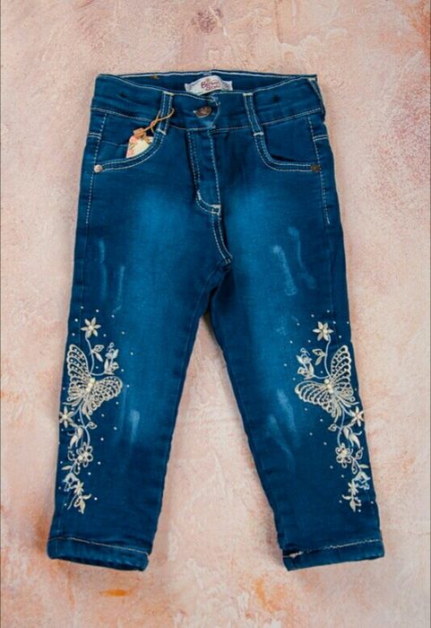 Джинсы на  травке новые