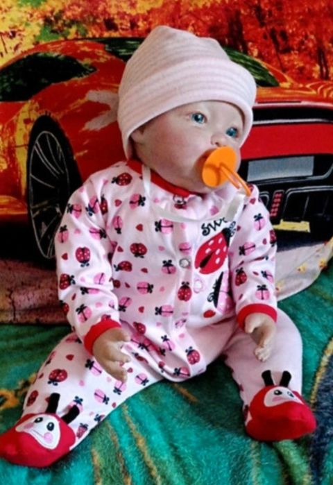 Duża lalka  bobas z minką  jak prawdziwe niemowlę ok.55 cm.