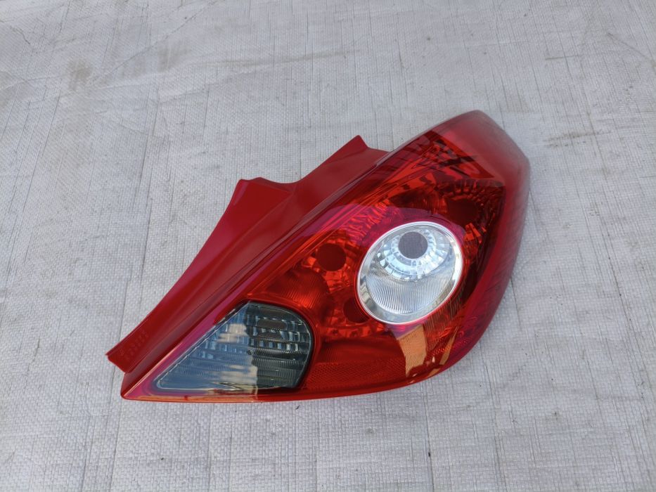 Opel Corsa D lampa tył tylna prawa zewnętrzna w błotnik nowa oryginał wysyłka