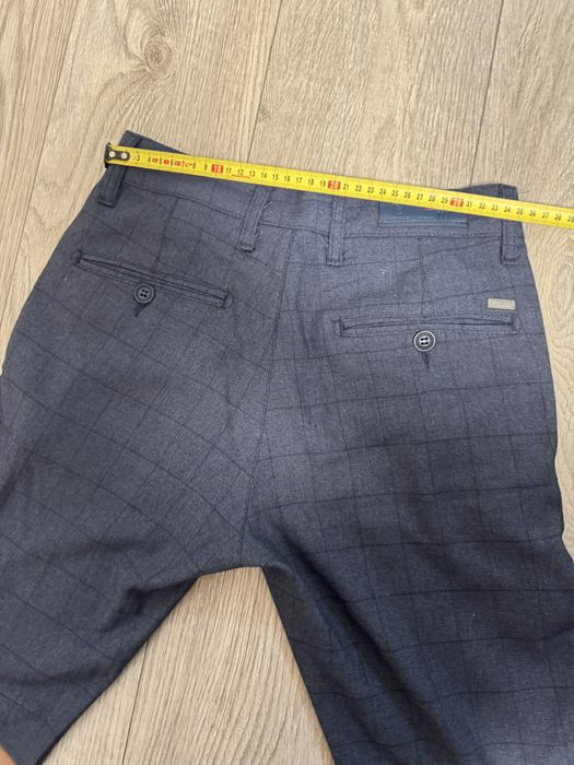 Чоловічі брюки в клітинку