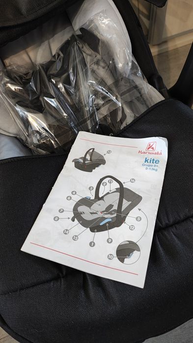 Fotelik nosidełko Karwala 0-13kg nowy + adaptery