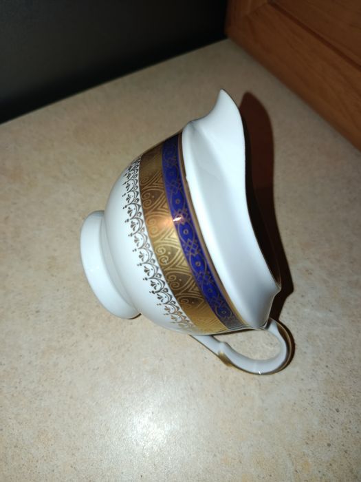 Śliczny stary mlecznik porcelana Karolina