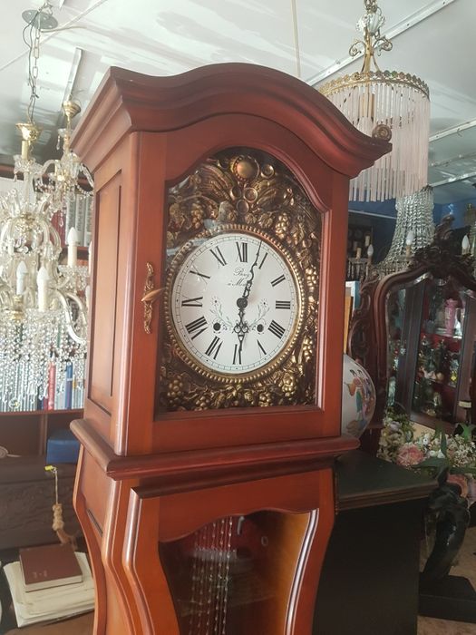 Relógio de coluna a corda