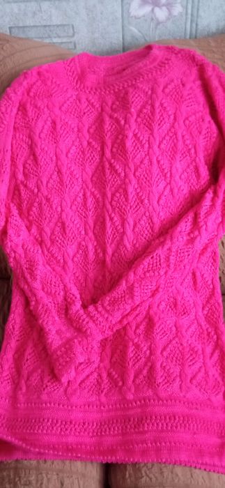 Туніка в'язана крючком,малинового кольору,без недоліків,рекомендую .