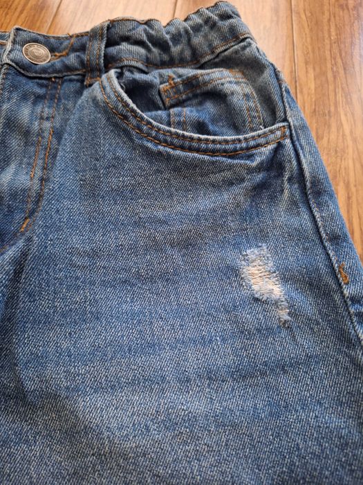 Jeansy boyfiend z przetarciami r.152