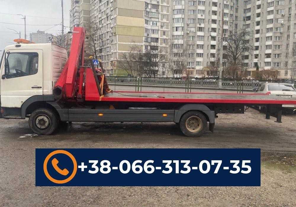Эвакуатор с манипулятором Киев. Перевозка авто, техники. Евакуатор