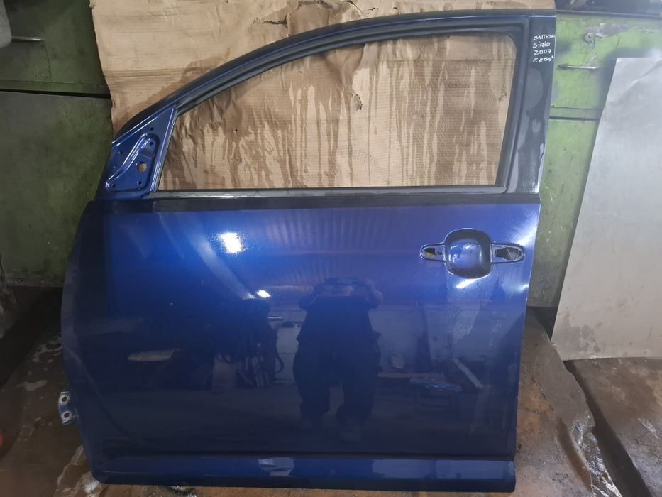 Porta; Fret esq Dayatsun Sirion ano 2007