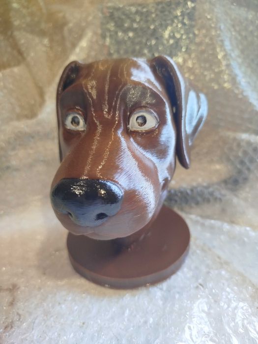 Прикольный ушедержатель в виде собаки.