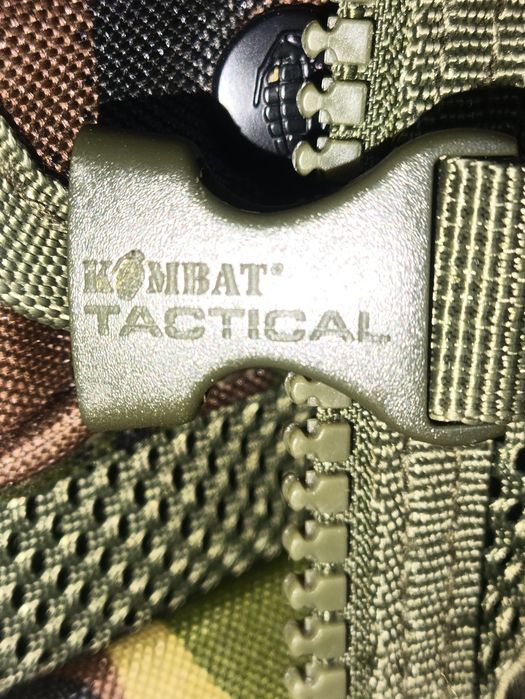Камуфляжний штурмовий жилет Kombat Tactical.