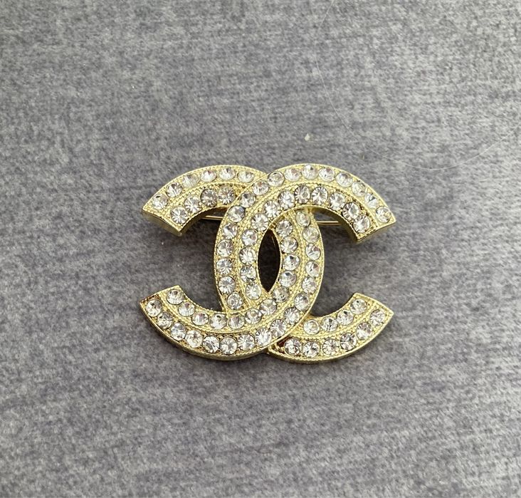 Broszka cc cyrkonia złota