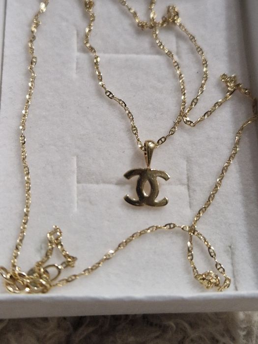 Łańcuszek Gucci złoty 585 z zawieszką chanel