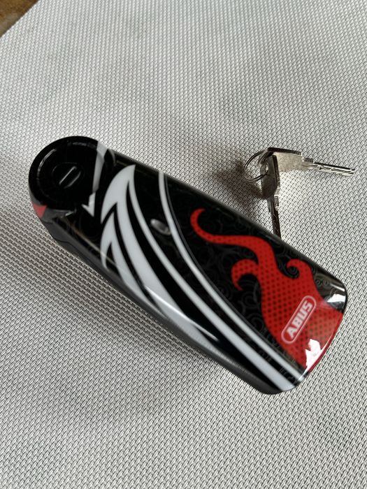 PREMIUM Blokada tarczy hamulcowej ABUS Detecto 7000 RS1 zabezpiecza motocykl rower ALARM 100dB !