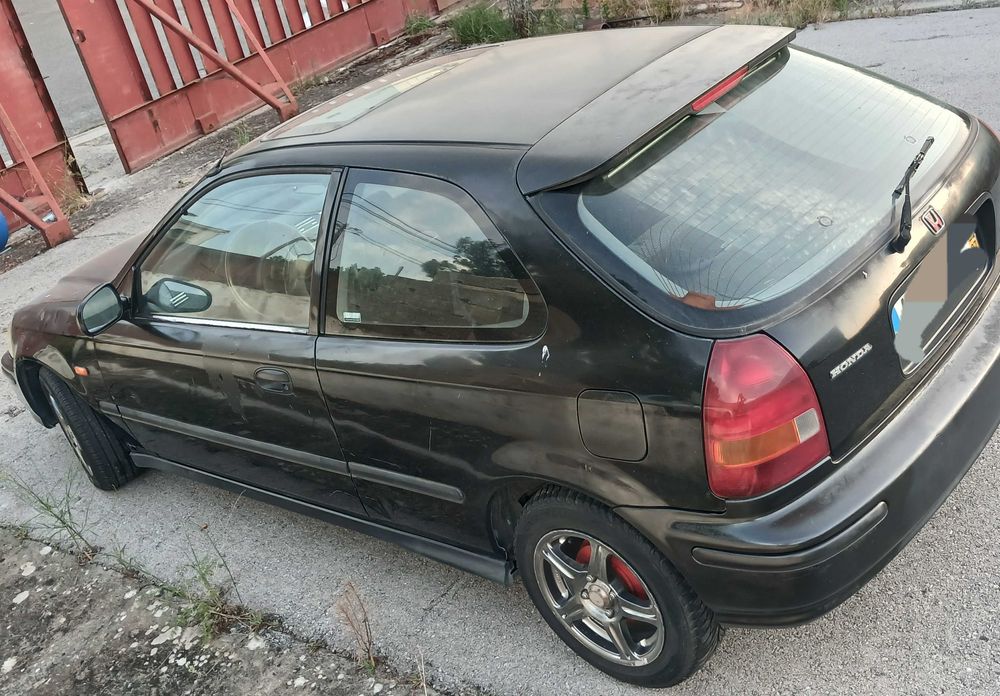 Honda civic . Barato.