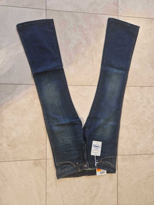 Nowe damskie spodnie jeansowe LEE dzwony rozmiar W26 L32
