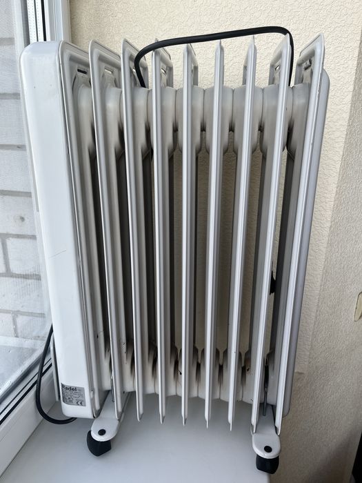 Масляний обігрівач Radel,Iталія