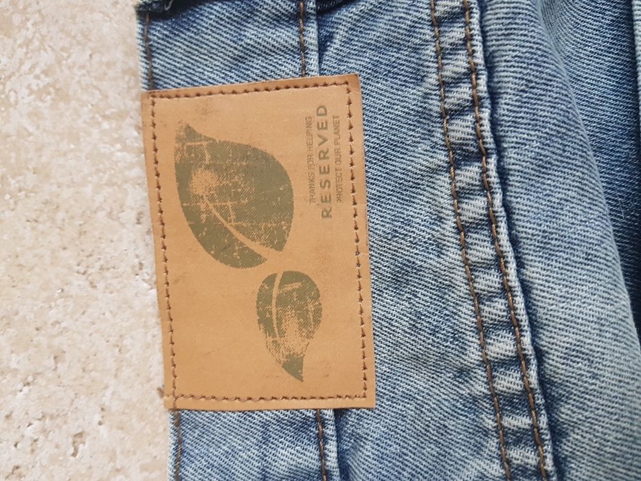 Nowe męskie spodnie Reserved rozmiar 33