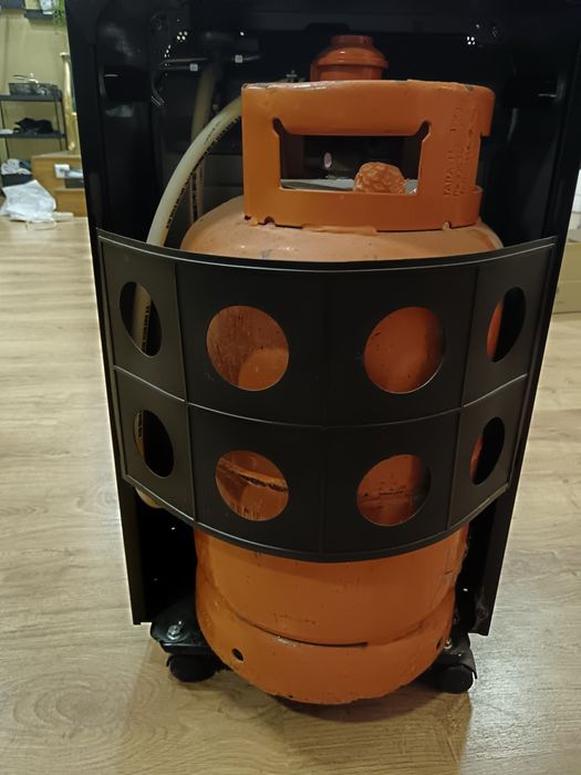 Aquecedor a gás butano Gralux — com rodas e grelha de proteção