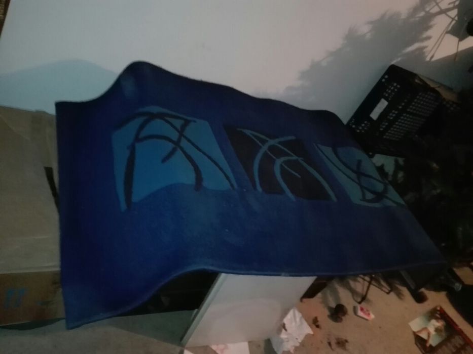 Tapete em excelente estado