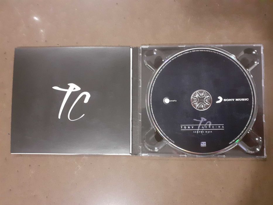 Cd do  Tony  Carreira novo  e livro