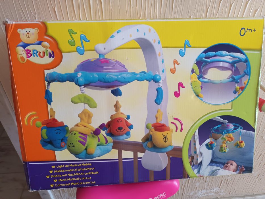 Brinquedo para cama de bebé