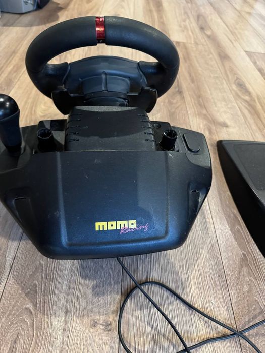 Кермо Logitech MOMO Racing 
Тільки по предоплаті