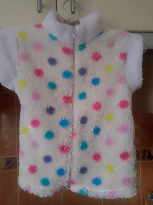 Теплі жилетки на зиму