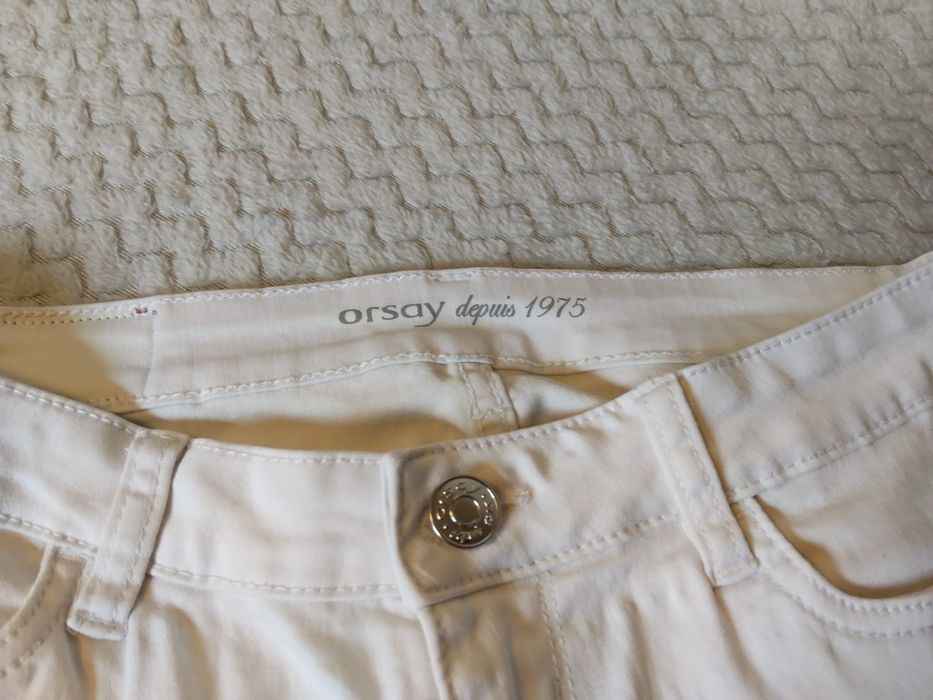 Białe jeansy damskie Orsay rozmiar 38
