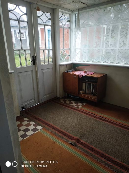 Будинок з великою земельною ділянкою