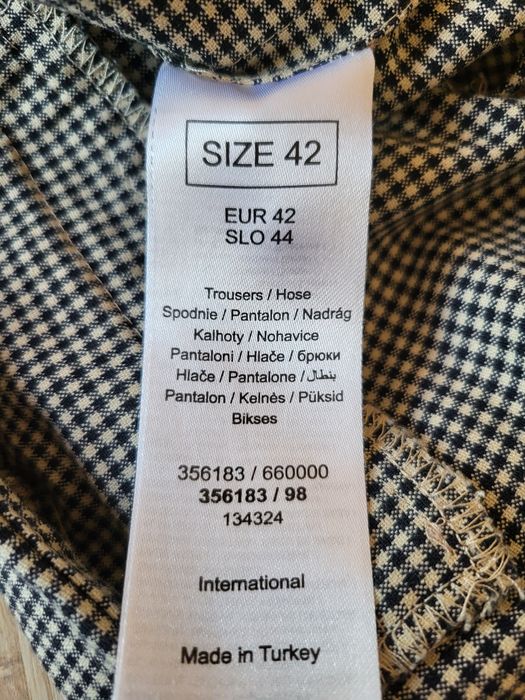 Spodnie cygaretki czarno białe w pepitkę Orsay r. 42