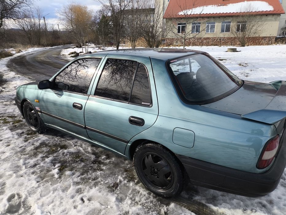 Nissan Sunny 1.4 бензин в чудовому стані авто машина Нісан санні