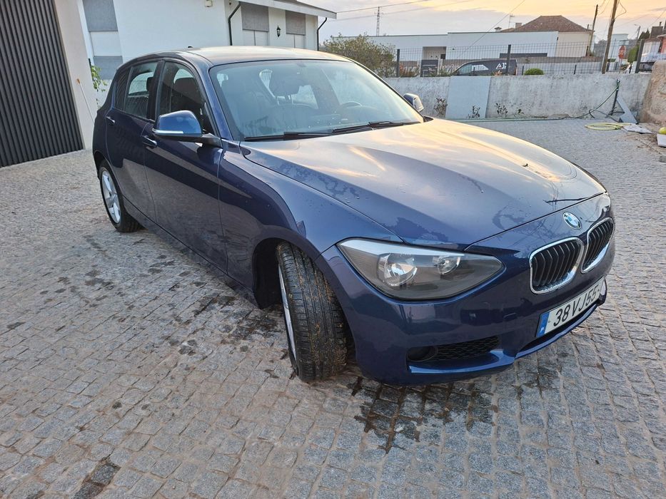Bmw 116D com estofos em pele