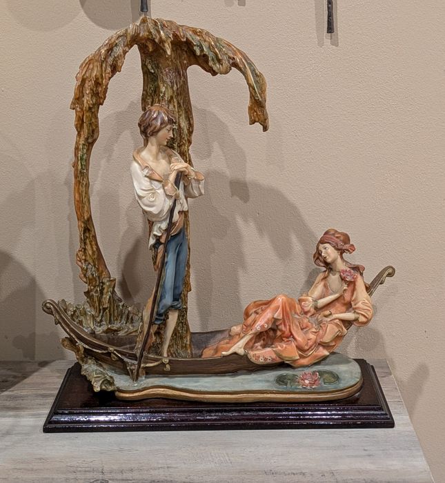 Estatueta de loiça64564191156354120