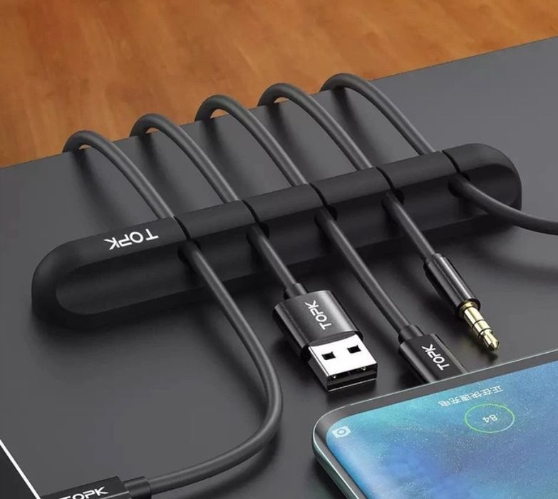 Тримач для кабелів