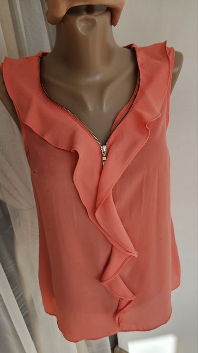 Блузи            .