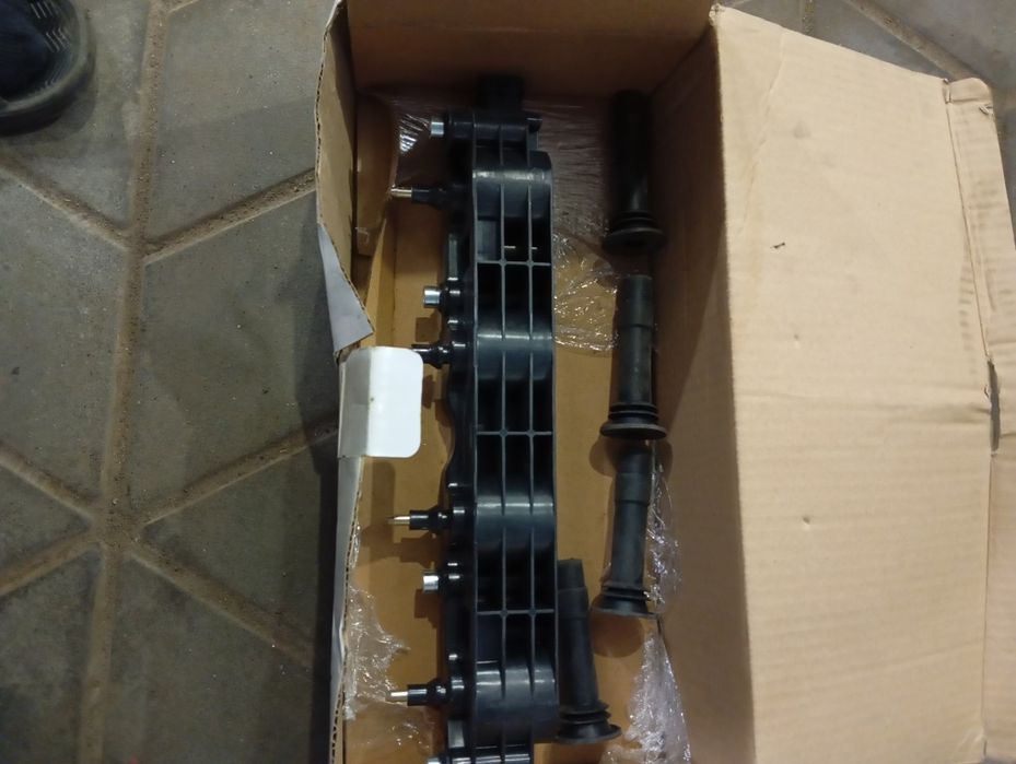 Котушка зажигания Опель комбо 1,6 бензин