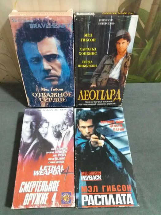 Видеокассеты с фильмами с популярными актерами Шварценеггер Сталлоне