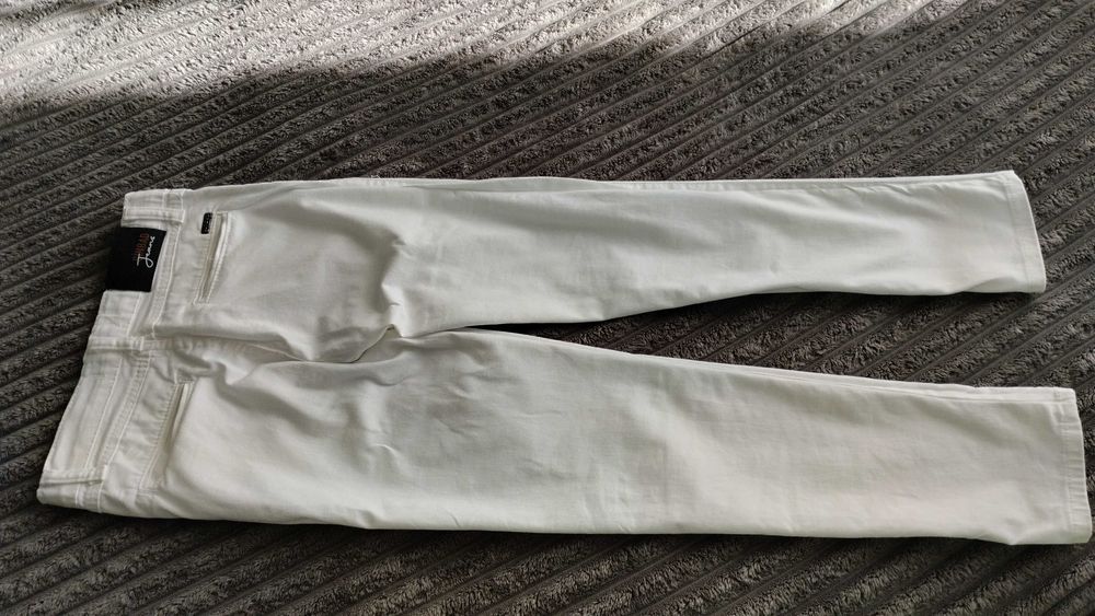 Білі штани на хлопчика 9-10 років