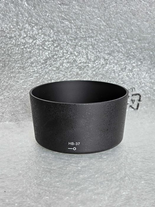 Para-sol HB-37 para lentes Nikon 55-200mm